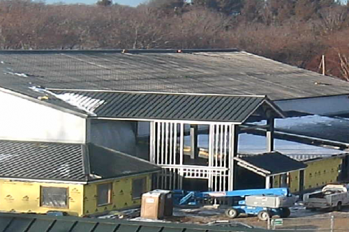 Athletic Center under construction in snow